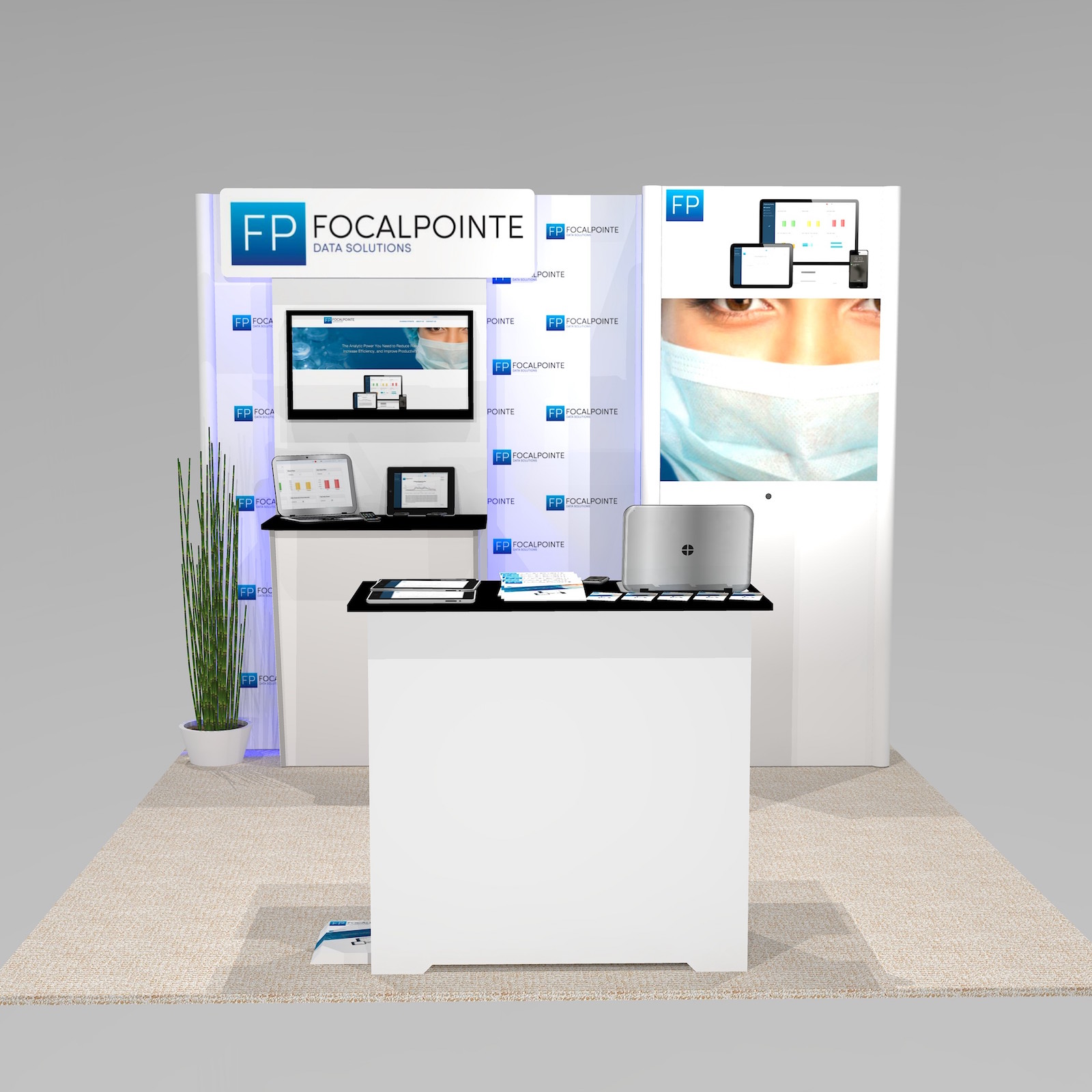 The IM1 trade show booth design features a large back lit image on the tower, with silhouette lighting behind the monitor wall section. Panel and logo sign above stand 6” in front of the main back wall for a custom 3D look. Lighting and signage make an impact. View 1