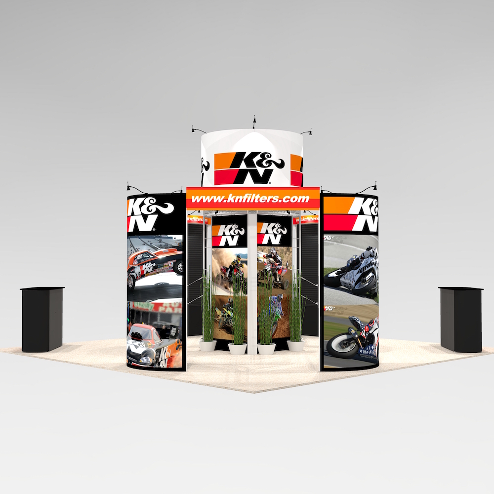The ASH2020 island exhibit tower design offers many options for customization. Options of curved graphics or flat slat wall panels for product, flat screen presentations and work stations. Separate and space out the meet and greet areas and booth space for product demos. View 2