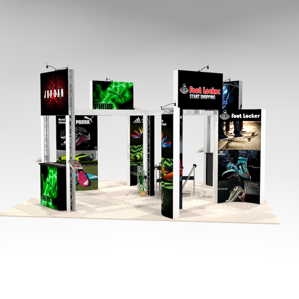 The FRA2020 offers impactful graphics and slat wall for product display. An ideal trade show exhibit for clothing, jewelry, clothing, electronics and small products. A meeting area with ample counters and large mural walls for great visibility. View 2