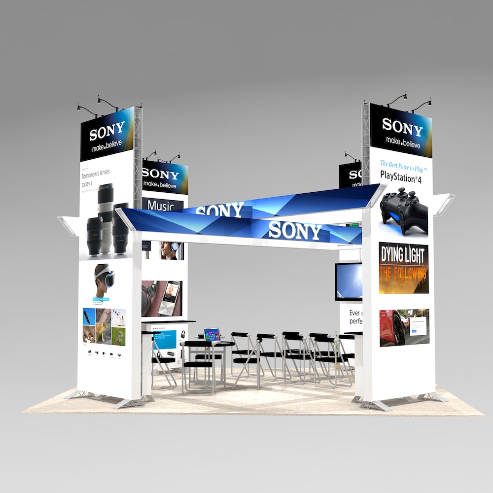 The HOL2020 trade show exhibit design is ideal for meetings, demonstrations and presentation. Customizable with theatre seating or individual work stations. Surrounded by four large, two-sided graphic towers. View 1