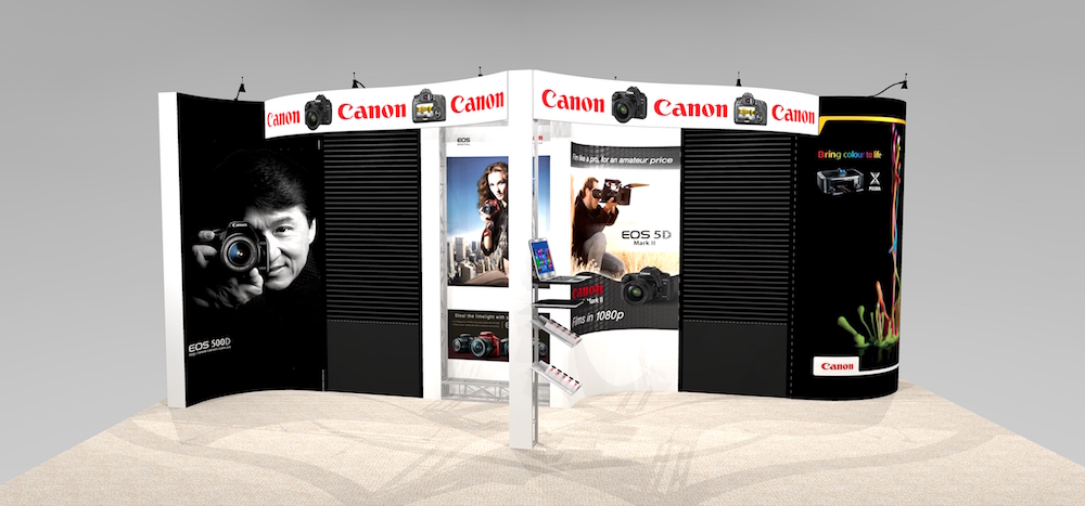 NAP1020 Exhibit rental showcases slat wall and graphics with a unique 20′ x 10′ trade show booth featuring opposite curved ends with a center curve and three flat 34.5″ wide panels. Optional Radius Headers in three different configurations. View 1