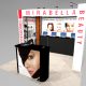 The ON10 is an asymmetric design standing out from other 10x10 displays by using 3D design to create a different look from every angle. Built in storage counters with a truss system can hold shelving, monitors, literature holders, and other accessories to customize your rental exhibit. Color accent tubes on sides of the main wall match the colors of your graphics or logo. View 3