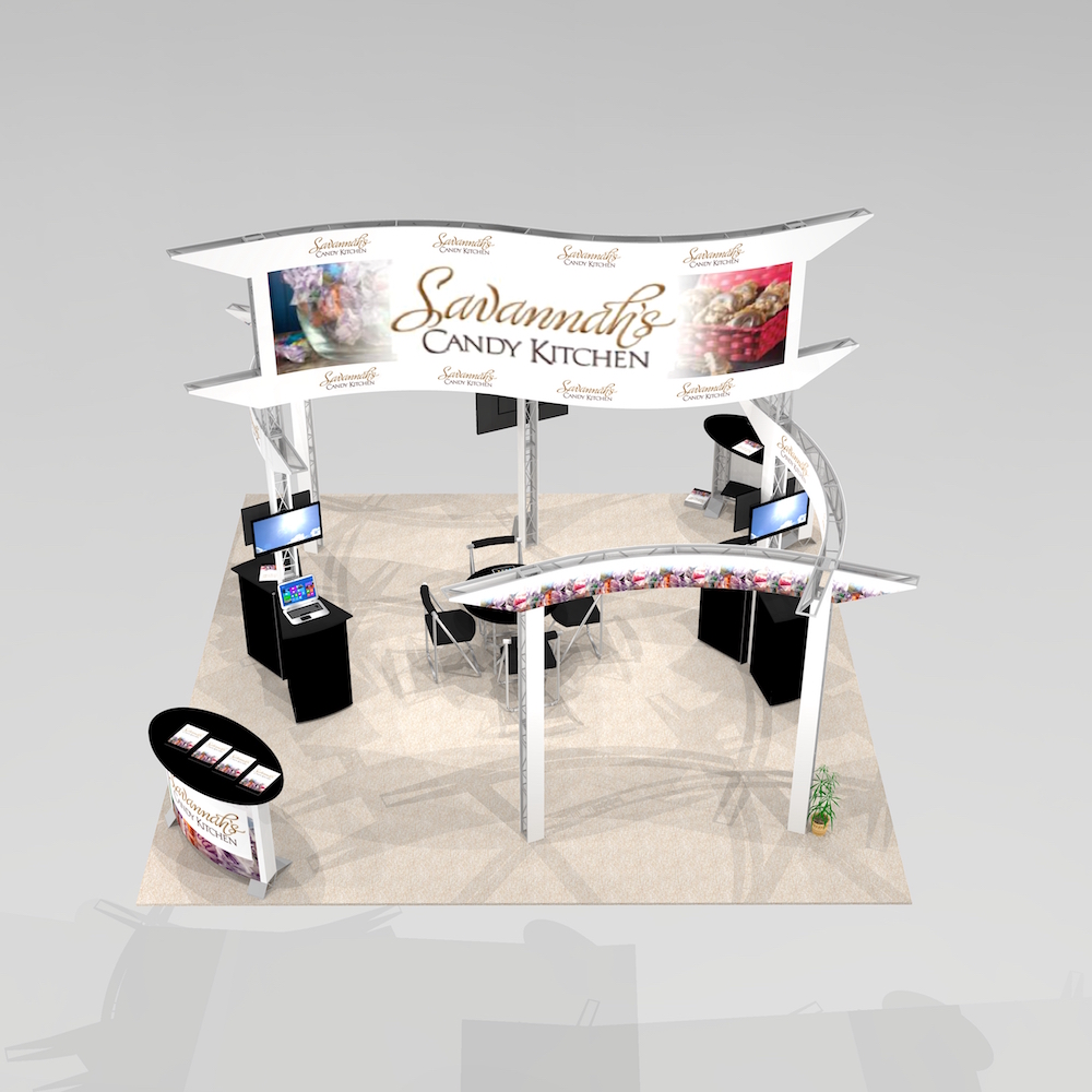 The PAL2020 is an island exhibit design featuring multiple curving panels just above eye level. A massive, raised logo sign ensures visibility throughout the trade show floor. Well-spaced towers with monitor screens and up to 7 workstations. View 3